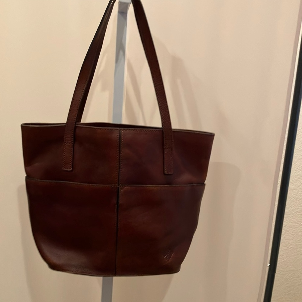 Patricia Nash mahogany brown satchel with  two shoulder straps.